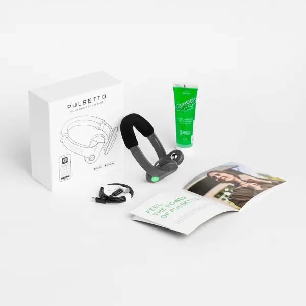 The Pulsetto Lite kit in the seller's own photo: the box marked PULSETTO vagus nerve stimulator, the device, a green conductive gel tube, a USB-C cable and a printed guide